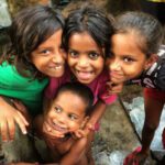India - Slums - Four Children - Three Girls, One Boy